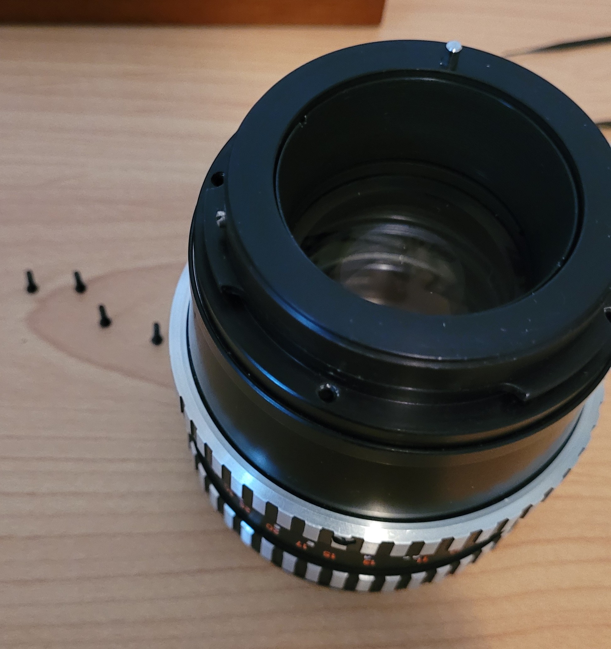 Close-up of oily aperture blades before cleaning